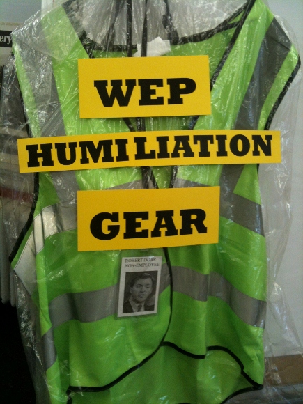 The “uniform” of some WEP workers, with added commentary and a badge featuring HRA Commissioner Robert Doar. At a recent action, CVH members presented Commissioner Doar with this vest and badge, which he refused to accept.