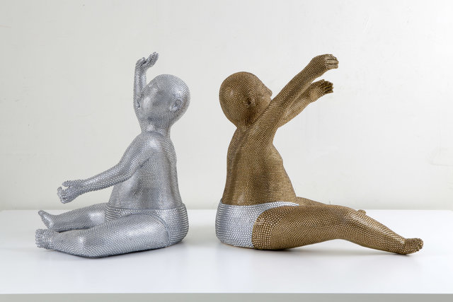 Orphan Babies (Gold and Silver), Dana Weiser, 2009-2010. Orphan Baby (Gold) 19" x 20" x 23", Orphan Baby (Silver) 16" x 24" x 25" Whiteware clay, Swarovski Crystals, paint and lacquer. Photo: Joshua White