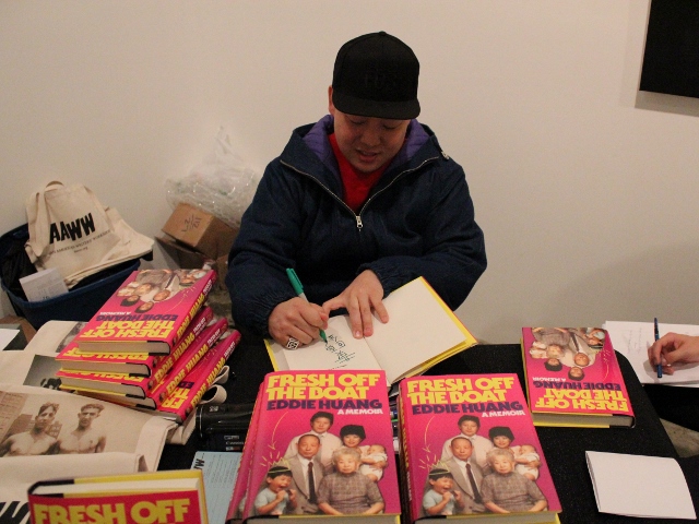 Eddie Huang signing copies of Fresh Off the Boat before the February 21 event with Miss Info at Chambers Fine Art.