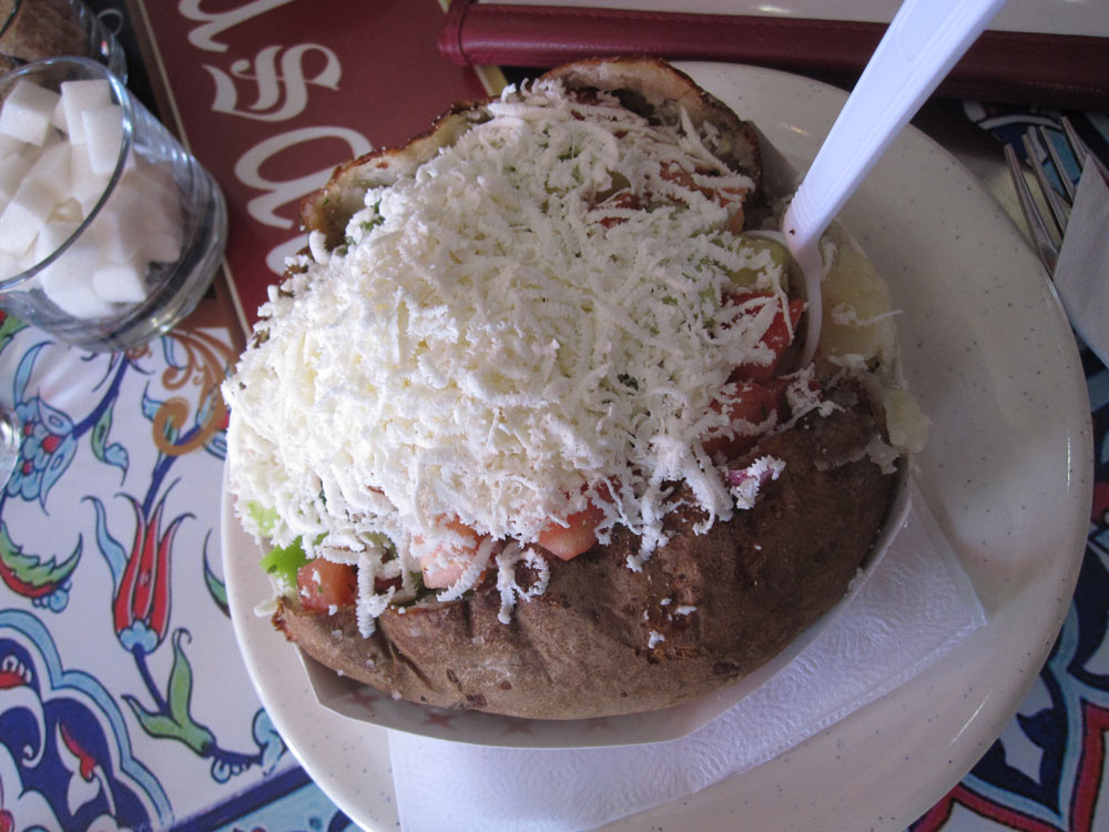 Greek salad served in a baked potato at Masal Cafe. Credit: Marwa H. Helal.