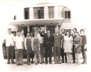 Alex Hing (center) in front of the Chinese Embassy in Pyongyang, North Korea, in YEAR. (Photo: Courtesy Alex Hing)