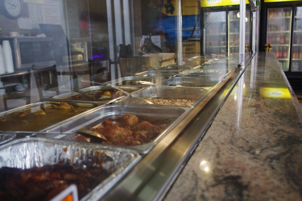 Hot dishes are laid out buffet style for fast and easy ordering.
