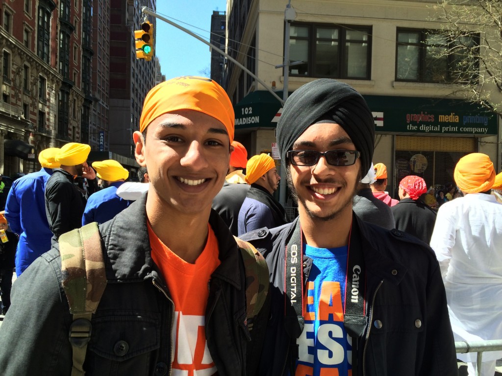 Richmond Hill residents Amar (Left) and Amrinder (Right) feeling positive about their work at the parade. 