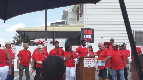Members of Stop the Prison in South Ozone Park organization at a neighborhood rally in August. Photo by Nadia Misir