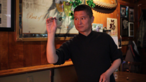 Jason Xie was the first Chinese to join the dart competitions in the Tavern.