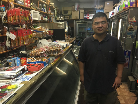 Jong-Min in his family's grocery store in Bensonhurst in May.