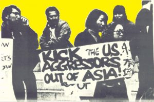From the cover of "STAND UP: An Archive Collection of the Bay Area Asian American Movement 1968-1974," Asian American Political Alliance (AAPA) protest outside of UC Berkeley's Greek Theater at a 1968 anti-war rally. Photo credit to Asian American Movement 1968.