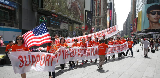  Trump supporters rally at Times Square on April 29 to express support for Trump's first 100 days. Photo by Mike Hong