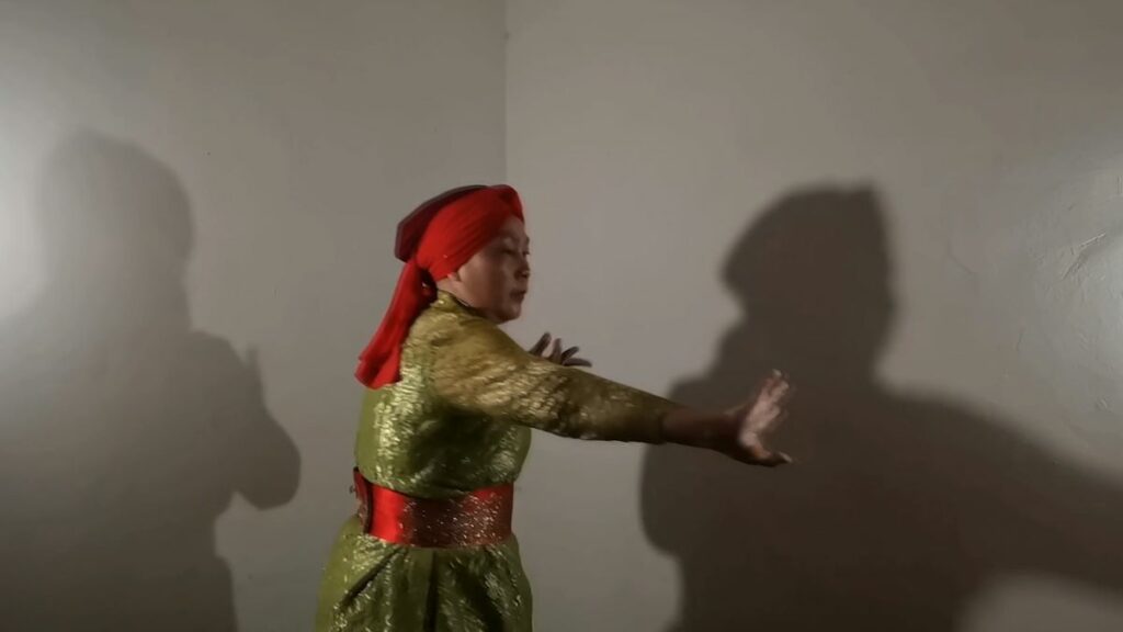 Film stills from Rasa dan Asa (2021) of Ningrum performing the Sundanese Jaipong dance. Images reproduced with permission from the film directors, Nasrikah and Okui Lala.